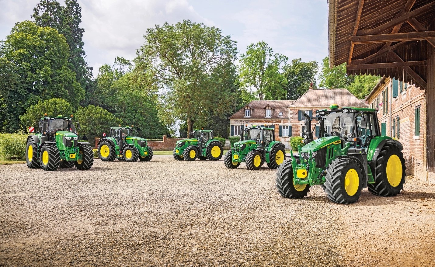 row of john deere tractors