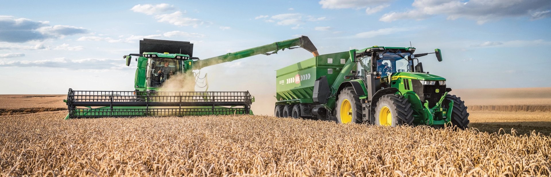 john deere tractor in a field