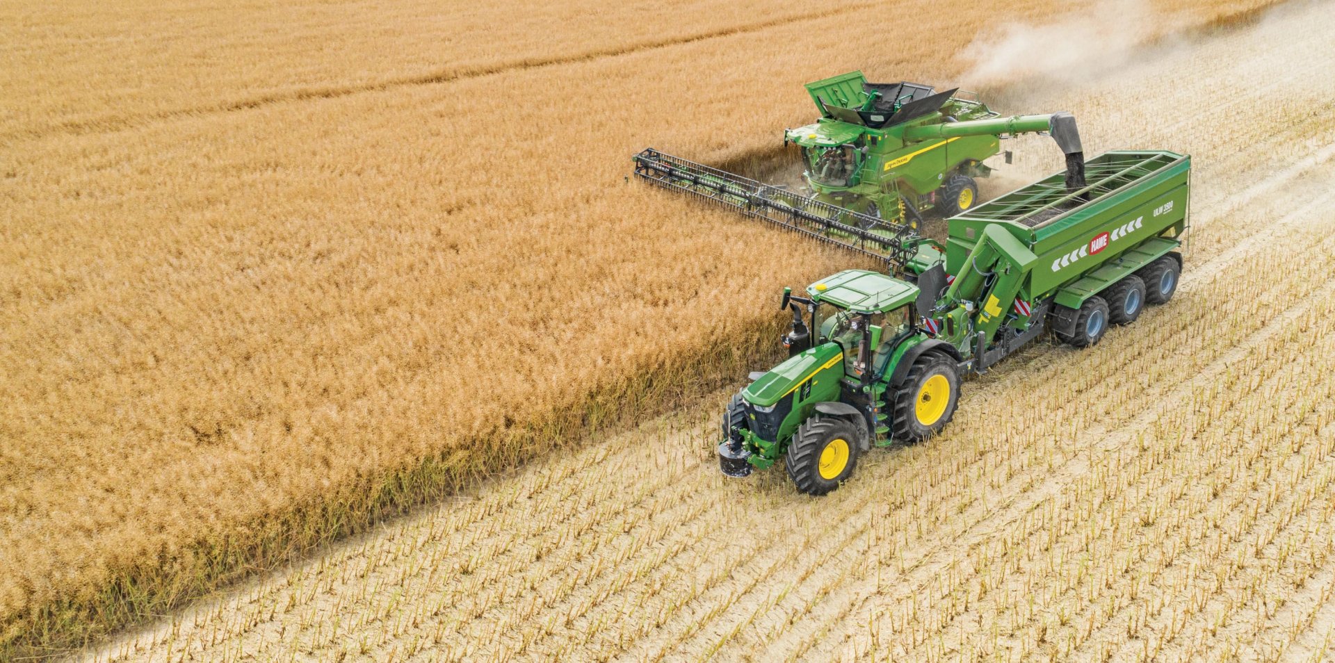 john deere tractor in a corn field