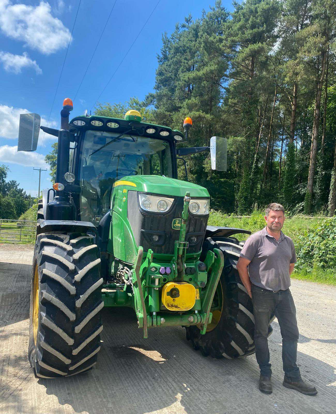 freddie down by a johndeere tractor